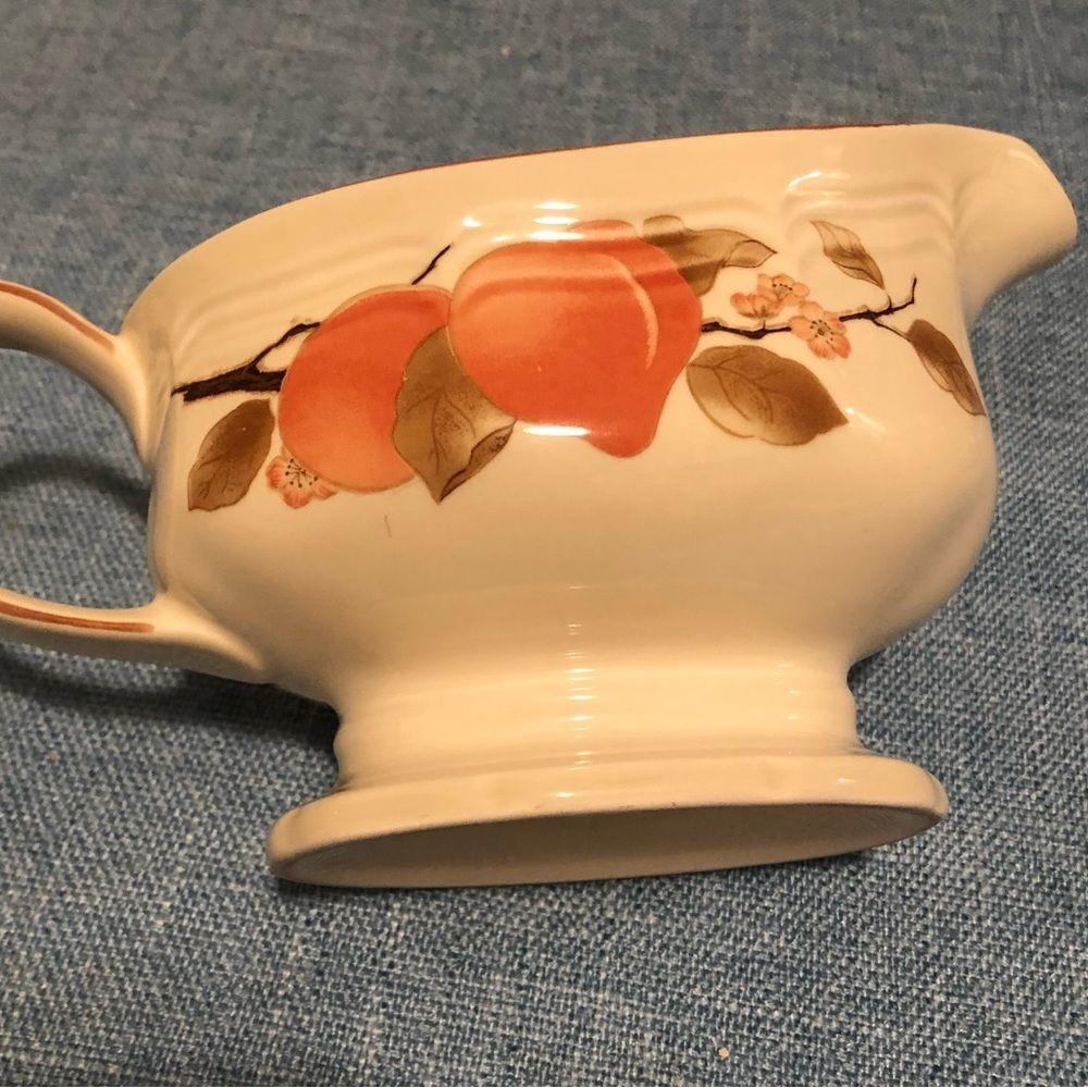 Gravy saucer by Mikasa.